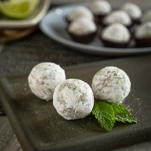 European white chocolate, toasted pecans, fresh mint, lime juice and Copper Run Overproof White Rum make this a summer favorite.  Kansas City gifts, bourbon balls, bourbon chocolates, Bootleg Bourbon Balls