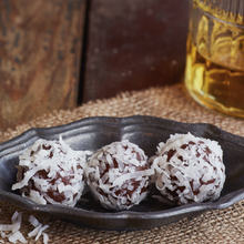 McCormick Caribbean Rum blended with Belgian dark chocolate, rolled in coconut.  Kansas City Gifts.  Kansas City Chocolate.  